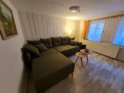 Ein Sitzbereich in der Unterkunft Ferienhaus Schatzliebe