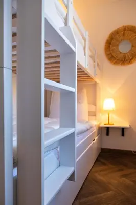 Ein Bett oder Betten in einem Zimmer der Unterkunft Blablu - Ferienhaus Bäckerei Koch