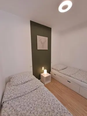 Ein Bett oder Betten in einem Zimmer der Unterkunft Ferienwohnung Skadi, Hahnenklee
