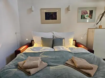 Ein Bett oder Betten in einem Zimmer der Unterkunft Gartenhaus Schlanstedt
