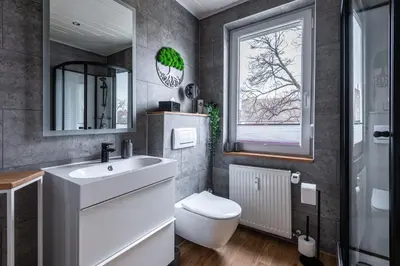Ein Badezimmer in der Unterkunft Neu! 9,9 Außergewöhnlich! Boxspringbetten Kaffeevollautomat inkl Bettwäsche und Handtücher #MeeneFewo de