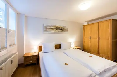 Ein Bett oder Betten in einem Zimmer der Unterkunft Ferienwohnung 2 - Marktkirchhof