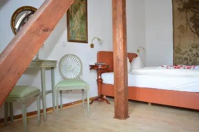 Ein Bett oder Betten in einem Zimmer der Unterkunft Maisonette-Appartement