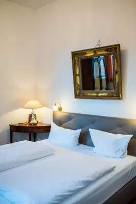 Ein Bett oder Betten in einem Zimmer der Unterkunft Ferienwohnung mit Balkon - a86244