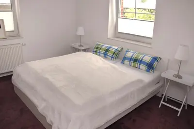 Ein Bett oder Betten in einem Zimmer der Unterkunft Ferienwohnung Hof Konietzke