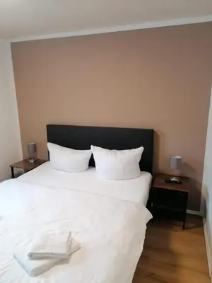 Ein Bett oder Betten in einem Zimmer der Unterkunft Ferienappartement Bodekessel
